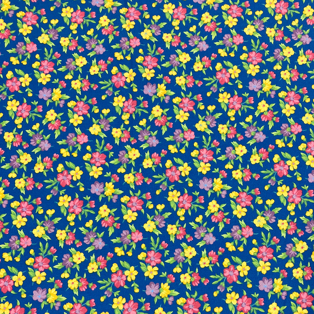 Multi-Color Blossoms on Blue Fabric