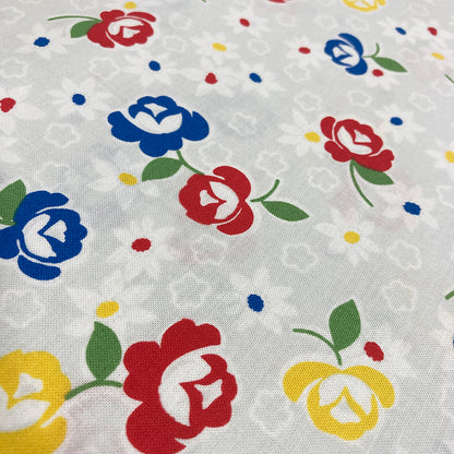 Primary Roses on Off-White Fabric