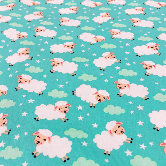 White Sheep on Aqua Fabric